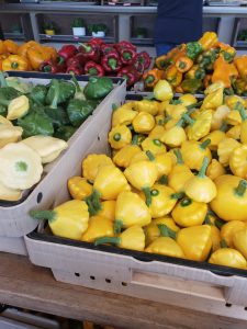 Colorful seasonal squash and peppers at a San Diego farm stand